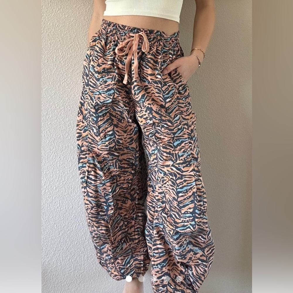 Free People Movement Orange and Black Trousers New without tags
